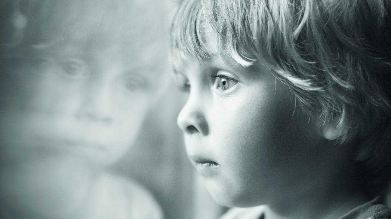 Little boy looking through window.; Shutterstock ID 154732991; Purchase Order: -