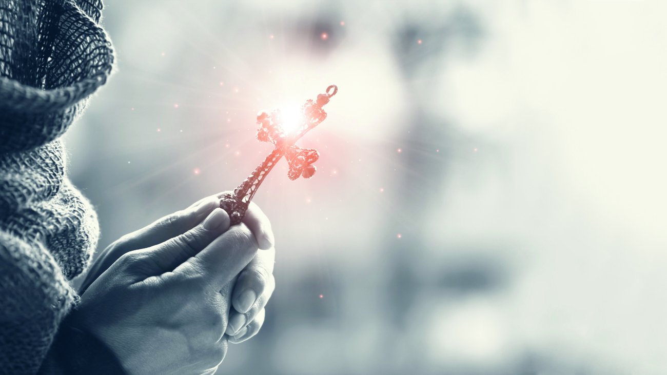 Christianity woman with christian cross in hands praying for blessing and hope from god.
; Shutterstock ID 1383373610; PO Number - Raise a BBC PO Using Vendor No. 1150465: -; Employee Email: -